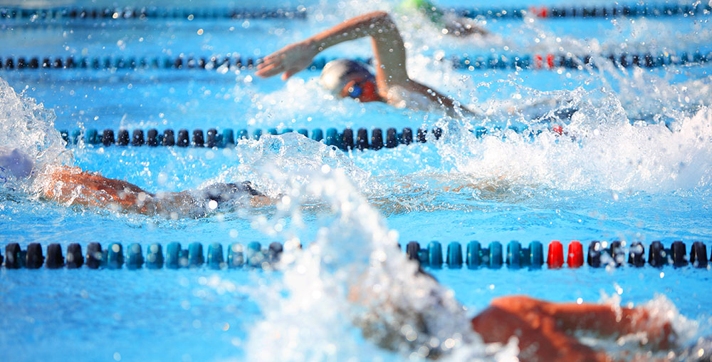 An olympian swimming in a pool