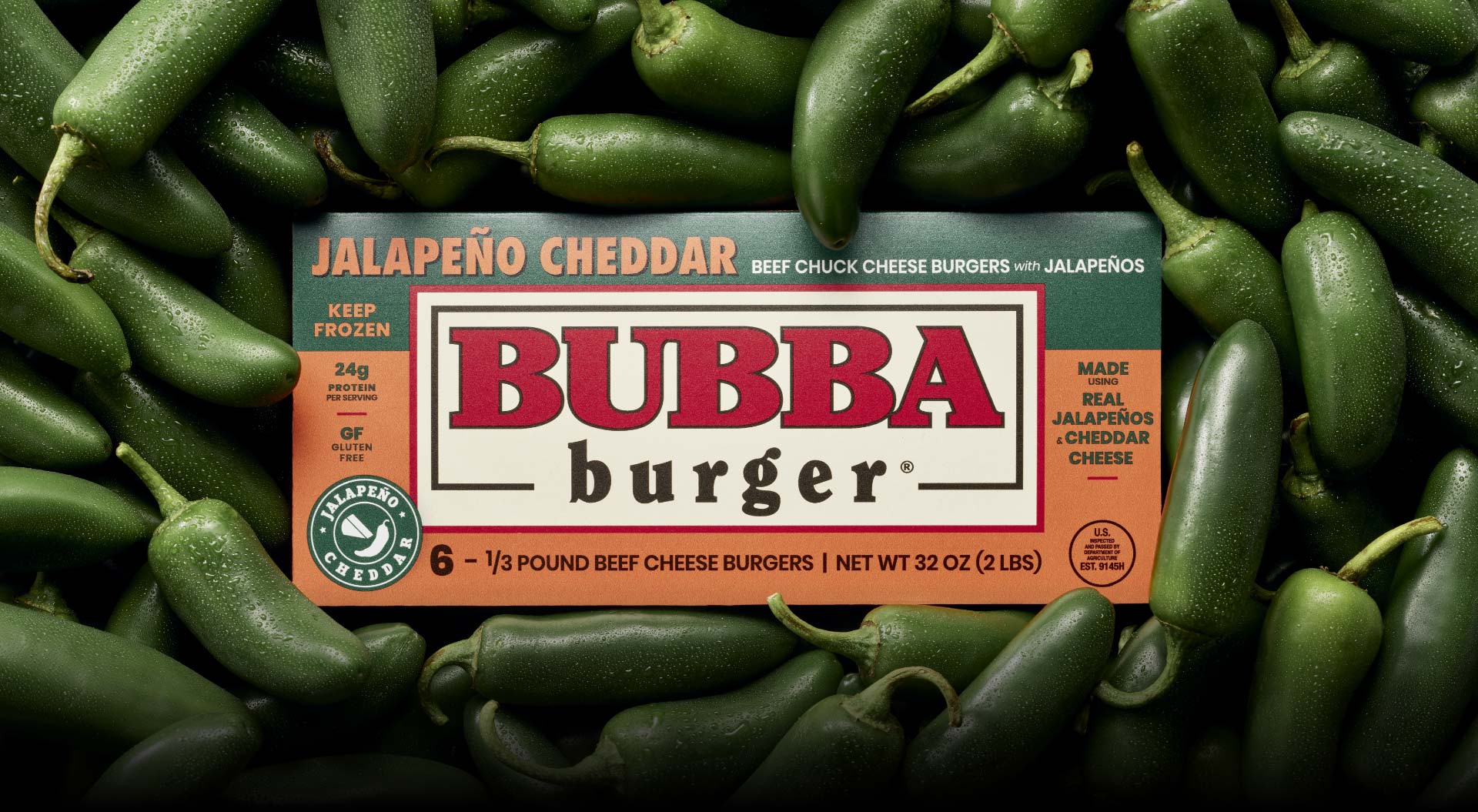 A jalapeno cheddar BUBBA burger® package surrounded by jalapenos
