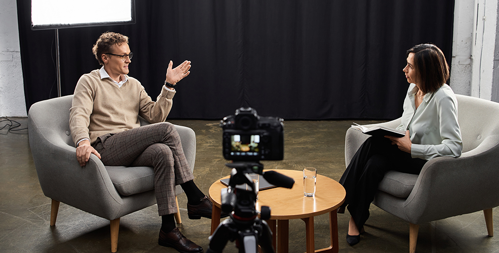 Two people talking to each other during an interview